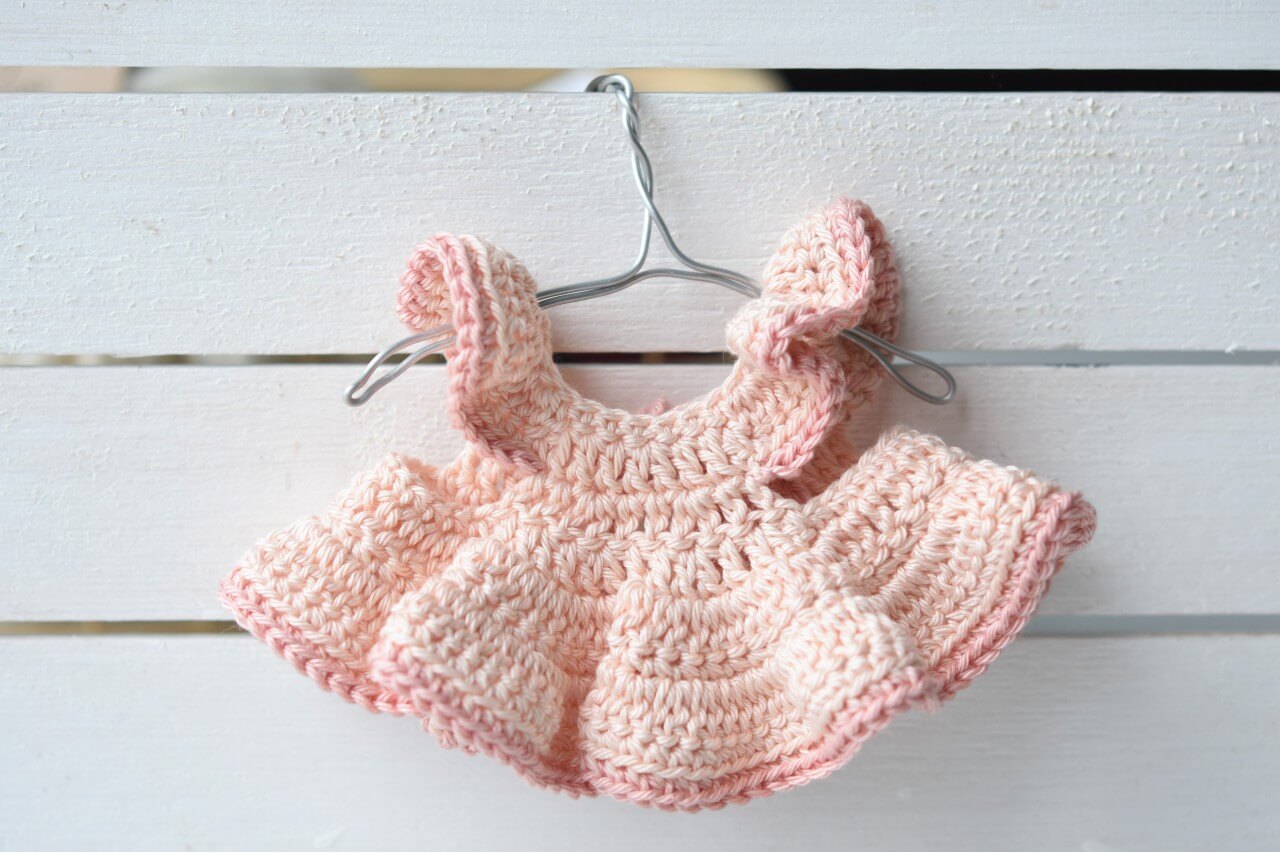 https://www.lilleliis.com/wp-content/uploads/2020/12/crochet-doll-dress-pattern-1.jpg